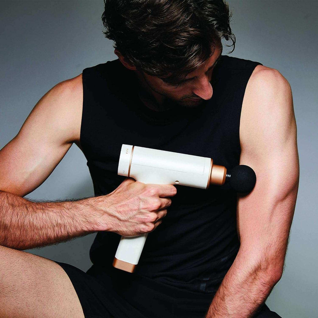 Kitta - Performance Percussive Sports Therapy Massage Gun by Synca Massage Chair